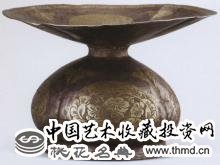 鎏金团花纹银唾壶 图片来源：中国考古